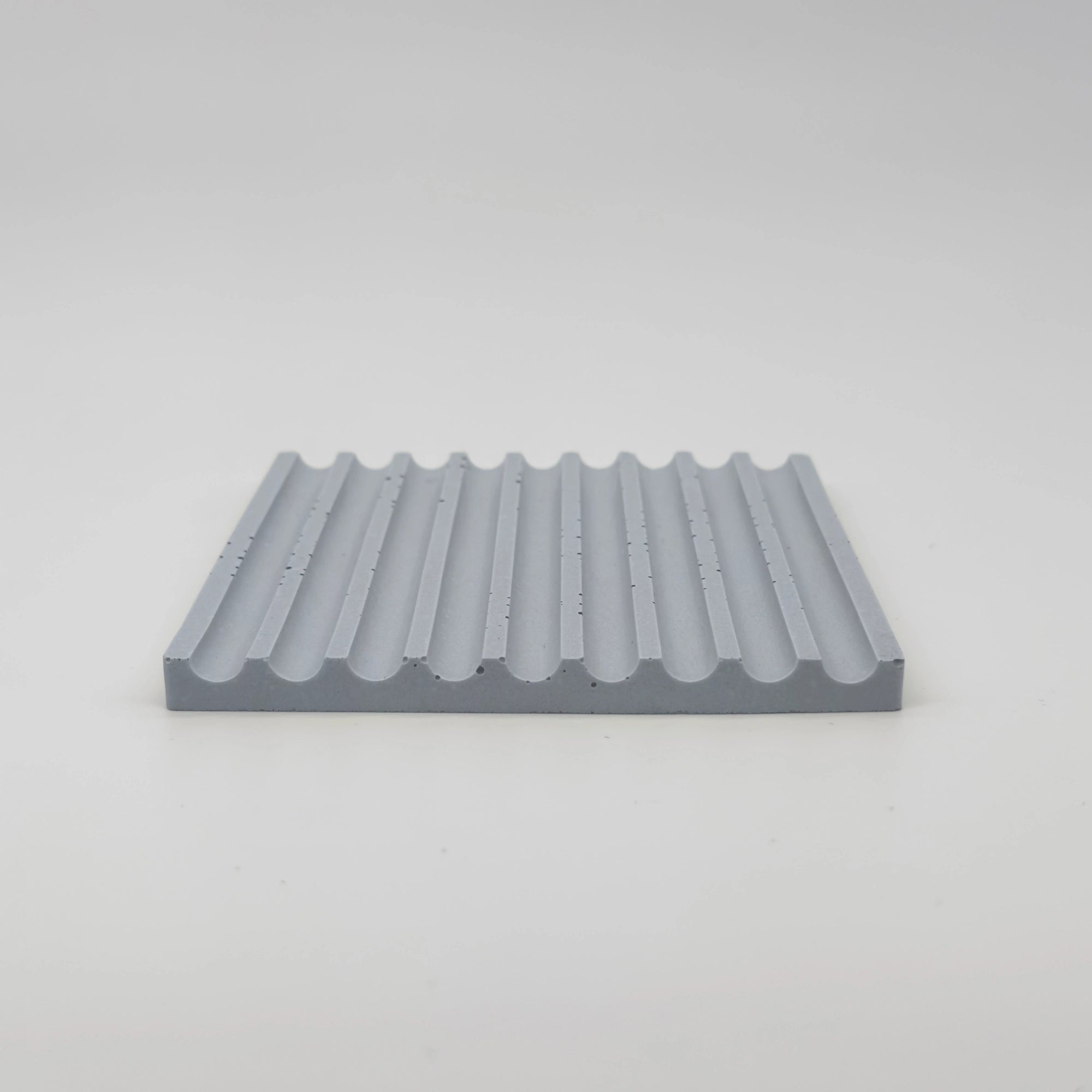 Angularis Tácek s vroubky z UHPC betonu čtvercový