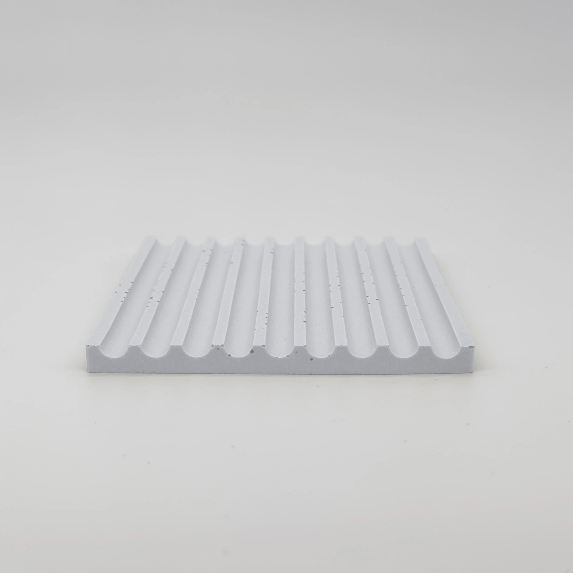 Angularis Tácek s vroubky z UHPC betonu čtvercový