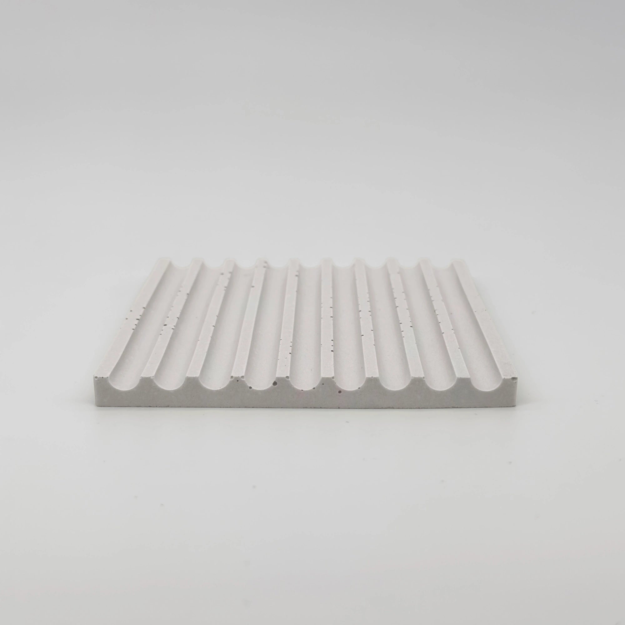 Angularis Tácek s vroubky z UHPC betonu čtvercový