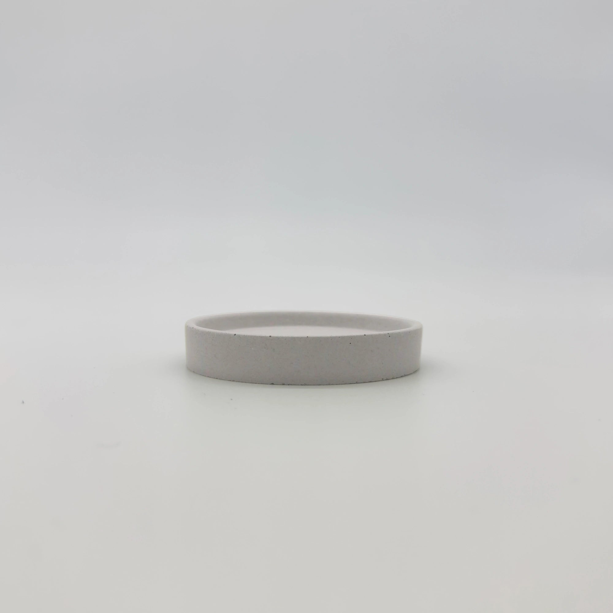 Rounder Podtácek s hranou z UHPC betonu kulatý 10cm