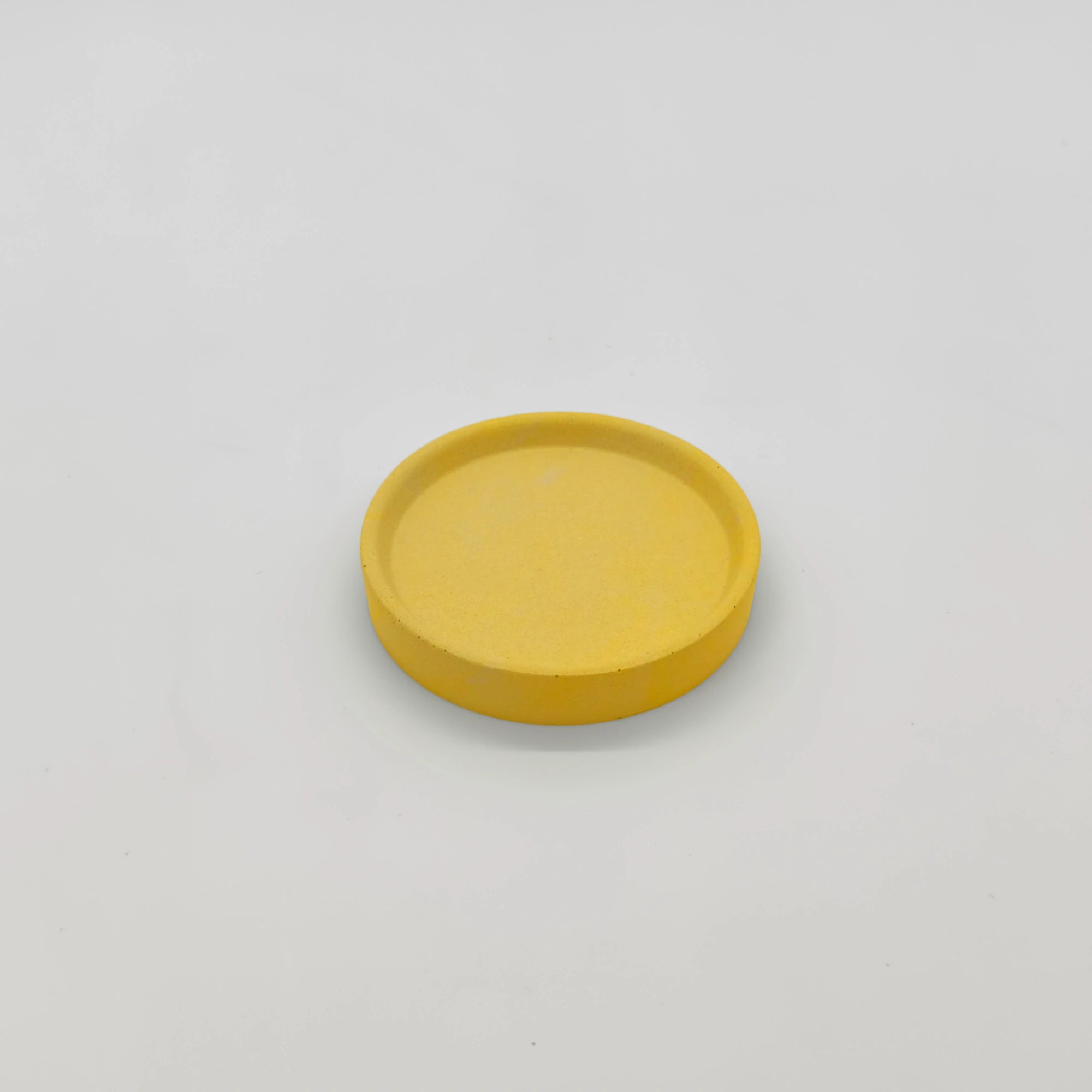 Rounder Podtácek s hranou z UHPC betonu kulatý 10cm