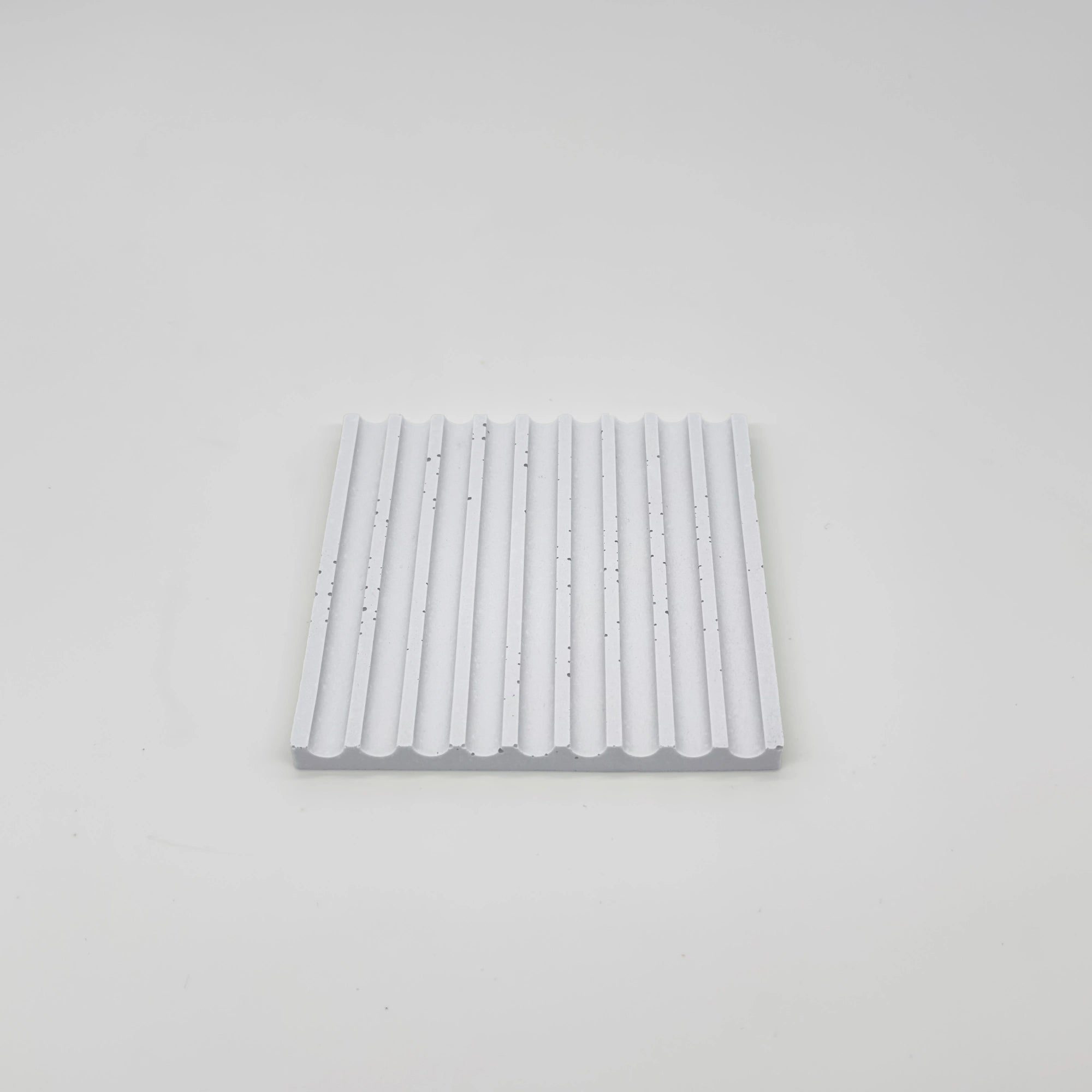 Angularis Tácek s vroubky z UHPC betonu čtvercový