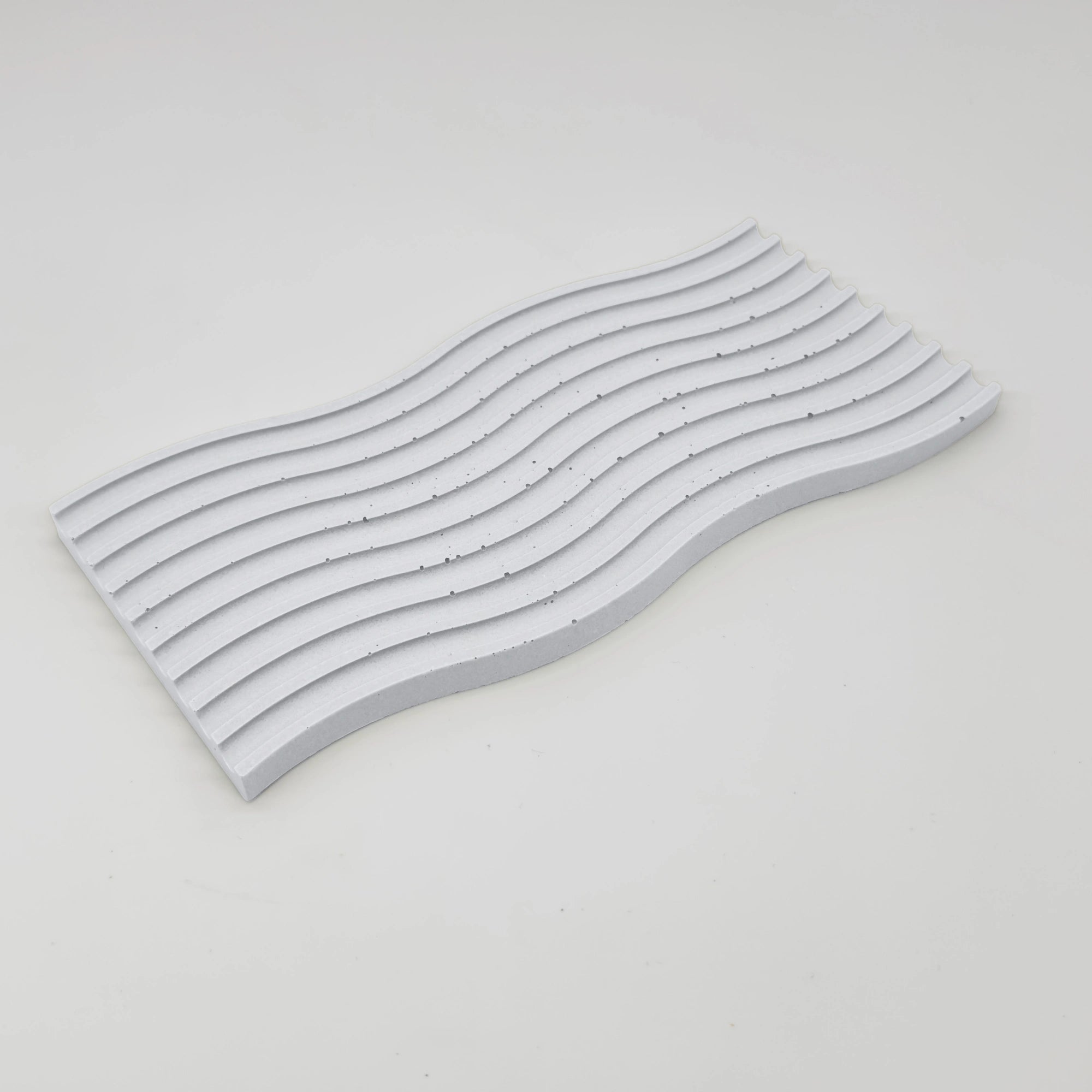 Fluctus Tác vlnitý obdélník s vroubky z UHPC betonu