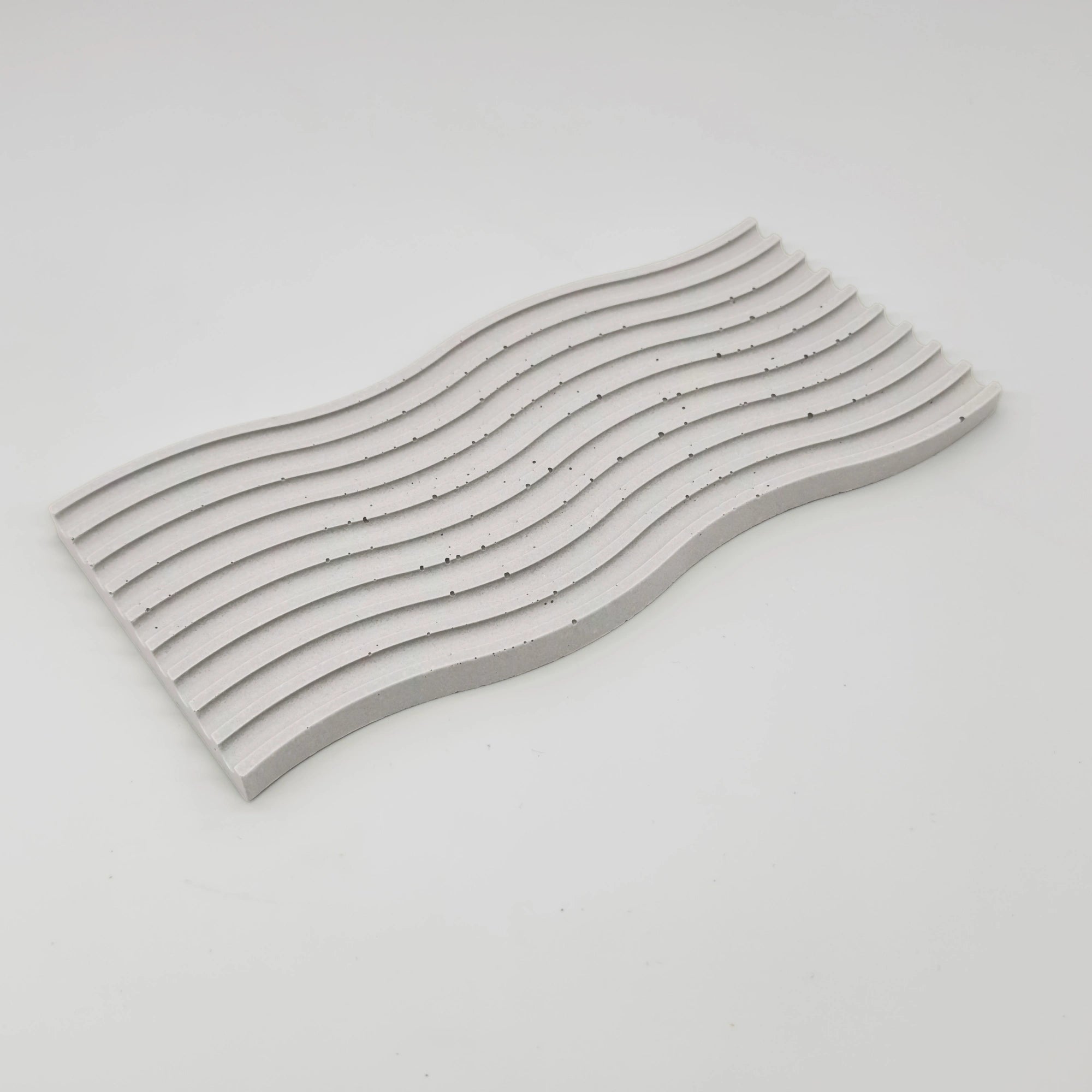 Fluctus Tác vlnitý obdélník s vroubky z UHPC betonu