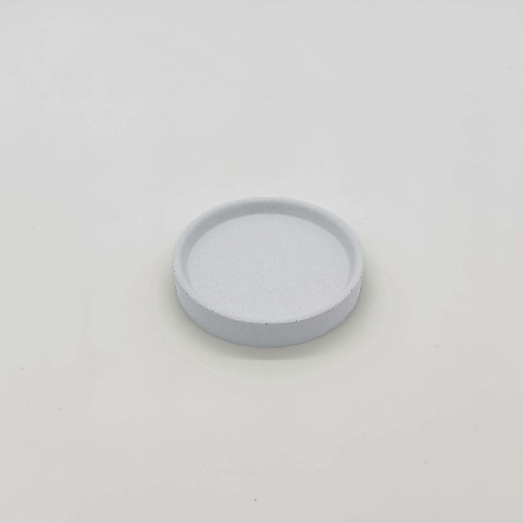 Rounder Podtácek s hranou z UHPC betonu kulatý 10cm