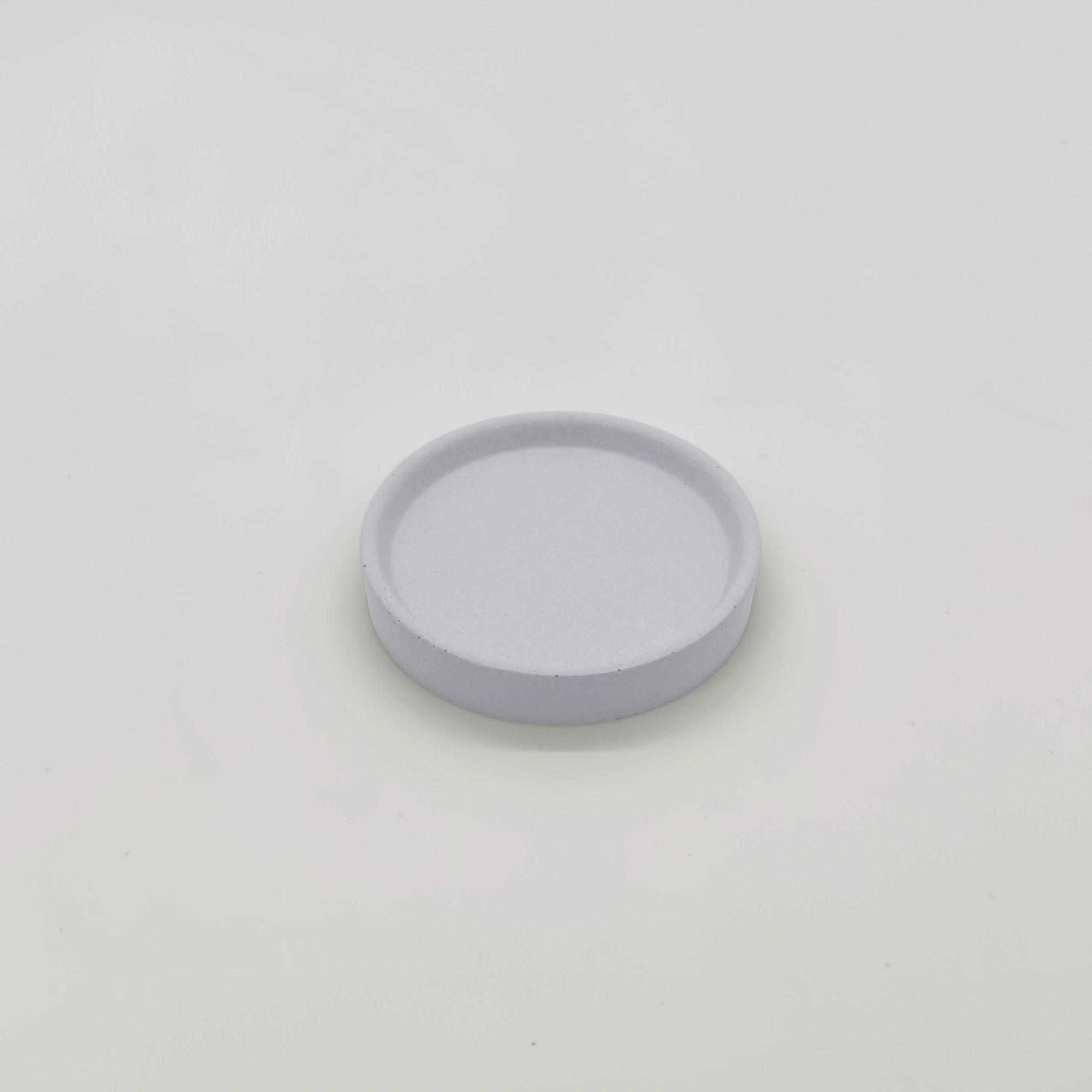 Rounder Podtácek s hranou z UHPC betonu kulatý 10cm