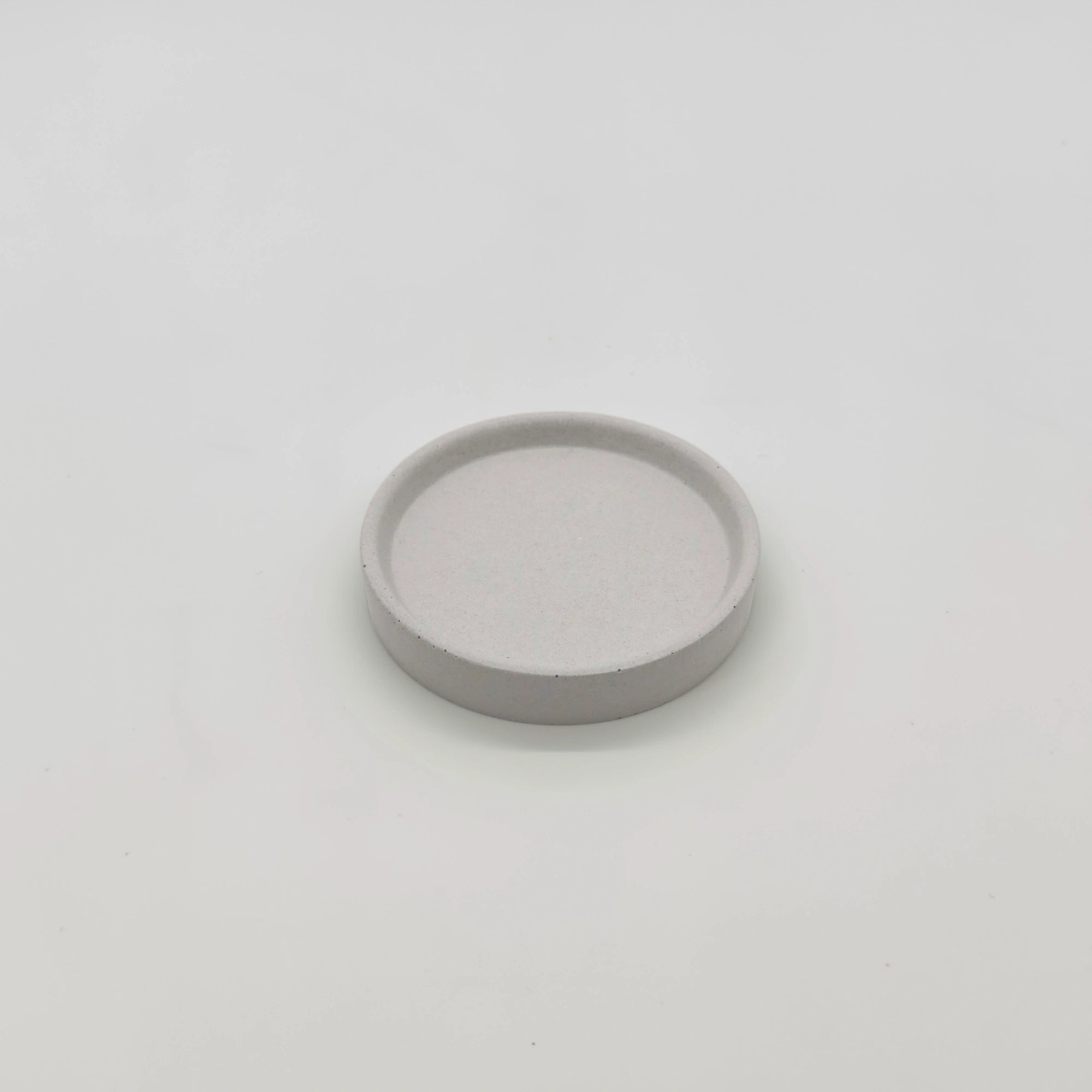 Rounder Podtácek s hranou z UHPC betonu kulatý 10cm